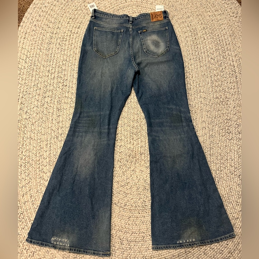 Lee High-Rise Flare Jeans in Skyline Blue Size 31 NWT Free People Distressed